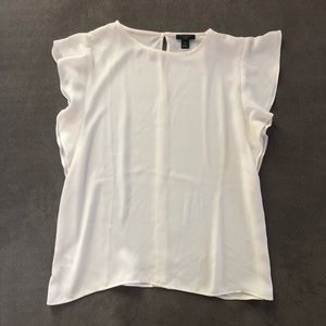 White blouse with flutter sleeves